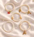 Five Pearl Bracelets on Ivory Silk.webp